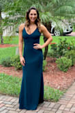I purchased this dress to wear to a fall wedding. The deep green color was beautiful! The dress fit perfectly; like it was made for me! The material is thick, but not hot or heavy. The neck line is very flattering and I love how the back is scooped a bit. I love the mermaid style fit. Hugged me in all the right places. I sometimes get nervous with ordering dresses online because I'm nervous they are going to be too short for me but this dress offered plenty of length! I wore a shirt heel (maybe 3 inches) with it and still had plenty of length. I typically wear a dress size 4-6 and a medium was the perfect fit. I got so many compliments while wearing this dress; even from strangers in the bathroom! SCORE! You will not be disappointed in this dress! - Natasha S.