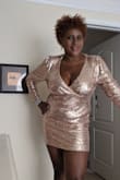 I liked the dress but I would have liked a little bit more hold in the belly area. Cute but it didn't do enough to make me love it. This is a photo of me trying it on to see if I wanted to keep it. This is a size large. I have other dresses similar to this style otherwise I would have kept it. - Tyrenna T.