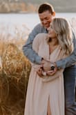 I wore this dress for my engagement photos and it did not disappoint! The fit is very flattering and it was very elegant. The size does run a bit large so I would recommend ordering down a size. - Katelyn M.
