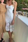 I wore this dress to my engagement party and received so many compliments! It was a good length even though I'm really tall. Love that the straps are adjustable. - Kelly M.