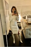 Absolutely adore! The sweater is thick and cozy, which was important to me because I don't want a see-through white dress. A perfect outfit choice for Thanksgiving or any holiday events - Taylor C.