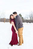 This burgundy dress popped so much against the bright white snow in our engagement pictures. It fits well, a little long but still great!! - Amy M.