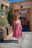 It was a tad long since I'm so short but this dress is really cute & super comfy. It does runs a little large but I have a straight body no hips so that probably doesn't help. I can't get an XS because I have a larger rib cage. Yes even though I'm like 100 lbs & 4'11. - Wendy L.
