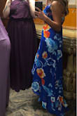 I'm normally a medium in Lulus dresses but I followed the other reviews and got a small. I would have been swimming in the medium. The colors of this dress are absolutely stunning I got so many compliments! Being a wrap is probably the only thing I hate about it. I did use a pin to keep the chest area together only because I was nervous it would unwrap while I was dancing or jumping around. The length with a heel was fine, once I took the heels off it dragged and would get stepped on. Doesn't matter, the dress is beautiful!! - Laura S.