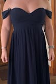 This dress is very cute! The navy was a beautiful color and the fabric was great. I didn't end up wearing it because I knew I would be pulling the top up all night and the waist was a little tight, but I did really like it. - Maria W.