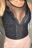 Absolutely love this bodysuit!! It fits perfectly and it made of really nice material. I would definitely buy this again! The mesh in the photo isn't as see through as it seems. I was in direct sunlight. - Kylie D.