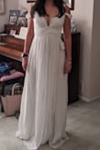 Beautiful dress but too tie! I should have order S, and not XS. But the dress is really beautiful. - Ariane A.