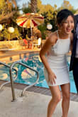 Highly recommend! I wore this as a bridesmaids dress. It is a little on the shorter side, but it is very flattering and unique with the scallop detail, low back and criss cross straps. Looks just like the photos. The fabric quality is great, it's thick and not see through at all. It is also lined. - Dominique N.