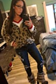 The sweater is so cute and trendy. Animal print is very in this fall! It's soft and cozy. If you like sweaters to fit a little small I would size down. I chose true to size and I love the slouchy look. - Alex K.