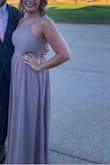 I loved the color and the style. It was too long for me, which I anticipated. I had it shortened and I had it let out about an inch and a half in the bust because it felt a little snug. - Julie O.