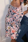 This dress is super cute for the spring/summer. I've worn it twice and got soooo many compliments. It's comfortable and flattering. I ordered a medium and I have a large bust, 36 G and it fit perfectly! - Robin P.