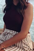 I have worn this so many times! Goes great with anything, and I love the high neck in the front. - Elma S.
