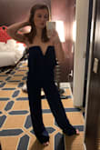 I am obsessed with this jumpsuit and it fit like a dream however the legs were extremely long (and I have long legs/am pretty tall) and didn't have time to get them hemmed, wore 3 inch heels and the bottoms were still dragging. So still buy it but give yourself time to get the legs hemmed or wear super tall heels - Lauren F.