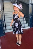 Beautiful day time dress. I do recommend having help putting it on and tying the back. - Cathleen B.