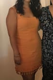 I love the tassels and the color. Receive lots of compliments every time I wear it. I am pear shaped so it's a little snug around my hips but otherwise really like the dress. - Eunice D.