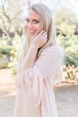 This light pink is so awe-worthy! I wore this for a photoshoot and it was such a gorgeous dress. Fits just right. - Mallory M.