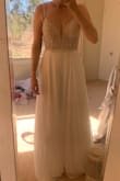 I ordered this dress on a whim as an option for my elopement dress. I wasn't expecting much given how cheap it is, but wow I'm in love! The quality is great and it feels and looks a lot more expensive than it is. The fit of the size 2 is great and it's super comfy too. I can't wait to wear this at my wedding! - Bonney E.