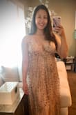 Got it for our friends wedding. Lovely dress that photographs beautifully. Runs a little big on the top and a bit long. Had it hemmed and the top taken in. Looked awesome! - Francine A.