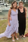 The dress fits beautifully and is the perfect size for me. It flows very nicely, but it does need heels to pick it up a little bit up at the back. Still a perfect fit. - Jessica W.