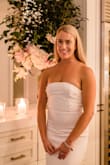 I wore this dress for my rehearsal dinner and it's SO STUNNING!! It was the perfect combination of elegant, chic, and super pretty with the little beads on the top half of the dress. They are securely on there, I had no troubles with how the dress came (I was worried there would be beads popping off). It photographed perfectly in my photos, I couldn't be happier! - Mallory M.