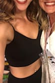 I bought this for a bachelorette party in the summer and it was perfect! It was so comfortable. The slit for the legs goes all the way up to the hip, but it is easily hidden and makes the outfit even more sexy. It is a lace up the back for the top which allows for a little leeway on tightening or loosening it. The pants are a zip and sit above the belly button. The pants are also the PERFECT length FOR ME. I am 5'11" and was weary on ordering this online in fear that they would be too short, but I was wrong. I am sure that they would be long for someone shorter than I but don't let that defer you from choosing this outfit! - Kelsey B.
