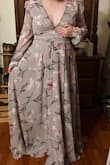 Starting off, let me say, this dress is gorgeous! It's very flowy, flattering and comfortable! I got a size large and it fit nicely mostly everywhere. Like other reviews have stated, it is very long and hard to cover the girls! It is amazing though and I'm looking forward to wearing it! - Morgan H.