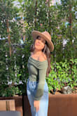 An off shoulder sweater is a must,  it's perfect if you live in Los Angeles! - Lily V.