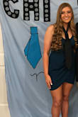 I absolutely loved this dress! I ordered it for a semi-formal date party for my sorority (which is why there is a tie around my neck haha) and I got so many compliments on it! Super comfy material and looks very good on! The wrap in the front hits in the perfect spot to hide any insecurities in the stomach region, as well as gives off a very confident way of viewing how you look!! The teal dress does look a little darker/more blue than I was expecting from the website but I honestly think I preferred the color it looked to me! It does ride up a little bit after sitting, but other than these two very small things, this is a wonderful dress! Would highly recommend!! - Haydon L.