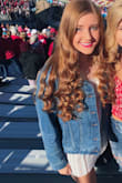 As a college student, part of attending football games is wearing cute outfits. I wore this dress to a college football game with a jean jacket and boots and I loved my outfit! Would highly recommend for schools that are red and white :) Sorry it's hard to tell fully what the dress looks like in the attached photo, it's the only one I have from that game, but the dress was super comfortable and worked perfectly for the game :) - Haydon L.