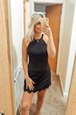 This simple black dress has a beautiful neckline and lovely edging at the bottom. Not only is it cute, it is very comfortable! I am a bartender and I wear black cocktail dresses and never have any issues with comfort and/or movement. I also took this dress on a girls trip and wore it on a night out dressed up with heels! Highly recommend. - Taylor L.