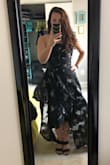 This is such a beautiful dress! I got it for a gala in DC and cannot WAIT to wear it! It fits well, doesn't try to slip down like strapless dresses tend to do for me (big hips), and I love that the train is removable. It hooks on around the waist with two clasps like a bra - I'm a bit nervous they'll bend and break off with a lot of movement - a small black ribbon tie would've been a little better, I think. - Bailey-Ann S.
