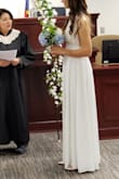 I ordered M by the size chart and the size expert chat, but it ended up being large. I returned it and purchased it in S, and it fitted perfectly. I am 6ft tall and was afraid it was going to be short, but it wasn't. I wore flats and it was perfect. If you want to wear heels it might be a little short if you are as tall as I am. I am very pleased with the quality and received several compliments on my dress. I would definitely recommend. - Ariela T.