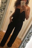 Love this jumpsuit for a date night out! A little tight but fits snug. The legs were super long (I'm short) but just got them tailored easily to be shortened. Feels sexy and low cut fun. - Darra L.