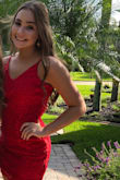 I knew this would be a perfect homecoming dress and absolutely loved the color and style when I saw it!! It fits pretty much true to size but I did have some room in the waist. The material was comfortable but the outer layer of lace did slide a bit with movement. - Sandra H.