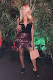 I wore this skirt with the bodysuit that the model pictured is wearing for my birthday party and LOVED IT! Got a ton of compliments as well. Normally, I am a size medium in bottoms but I read some reviews that it ran large, so I got a small and it fit perfectly. It was comfortable and perfect length (I am 5'5). Highly recommend! - Michelle D.
