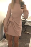 This dress was perfect for a wedding. The material is high quality, and the fit was just right. The tie in the front sags a bit due to the heft of the material, but that's a minor inconvenience compared to the overall quality of the dress. - Ishaan P.