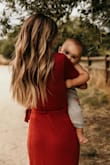 I got this dress in both colors. I really love the material and fit and colors, although the rust dress is definitely much pinker than it looks in the photo. - Chelsea S.