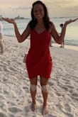 This dress is great! Nice material that isn't too thick but doesn't feel cheap. A medium fit well but I have big hips so it bunched a lil when I walked. Opted for the large. The front panel is very flattering and hid my mom pouch. Felt great in this dress - Megan B.