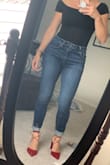 I love this top! It's a little snug, but I don't think I would change the size. I was worried that the sleeves would keep falling down too much but it seems to be pretty secure so that's great! I love the back also! - Evie S.