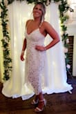 Wore it to my bridal shower. Totally aces, so many compliments. Fits true to size with adjustable straps in the back. - Jackie H.