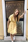This dress is so cute! The material is high quality and very thick. It is a bit longer in the back, but I kind of expected that from the pictures, and it is low cut, I pinned it at the top and it worked. It flows beautifully. Love this dress. - Kristen T.