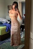 Oh my god, the pictures do not do this dress justice! It is absolutely stunning and the fit is amazing. I did take in the waist a little which is common for me with Lulus dresses. The fabric hugs your body in the most flattering way and the lace/sequins are good quality. It is more champagne/pink than the pictures show and could be worn to a wedding. I felt absolutely incredible in this dress, would recommend any day!! - YT K.