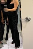 LuLus has done it again. Good quality. Perfect fit. The length was fine with heels. Surprisingly comfortable. Some review say that the bust was a little baggy. I ordered both the XS and S. The small was perfect. Easy return for the XS. I'd recommend doing that if you are ever are concerned about a fit. 
This jump suit fit perfect with a strapless bra. It was very classy looking for my bachelorette party in Las Vegas! - Alex C.