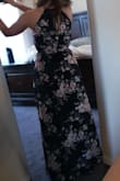 The dress is definitely pretty. It is a darker blue compared to the picture in the advertisement. I thought it was black at first. I had to have it hemmed, there was not way getting around it. It's a pretty dress that can be dressed up or down. - Micaela S.