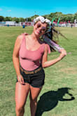 I would have ordered a medium since this fabric is really stretch. It's super soft and comfy. Perfect with denim shorts for a festival or with pants for a date night. Wish they had it in black. - Katherine N.