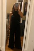 I bought this for a black tie wedding because I didn't feel like going the gown route. It fit like a glove and is so classy. With 4 inch block heels it was just about an inch too long so I had to have it hemmed. - Gabrielle C.