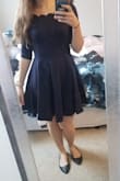 Loved this dress! It was a little tight on the arms but it wasn't uncomfortable. The dress is thick material but very stretchy. - Stephanie S.