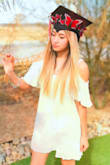 It's a cute dress that flows in the wind, and perfect for my graduation pictures! - Raquel R.