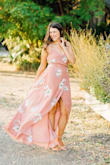 I originally bought this as a wedding guest dress. I got so many compliments I ended up wearing it for my engagement photos as well! I am between sizes for Lulus, never knowing to get a medium or small. The small in this dress is pretty loose on me, so I would suggest sizing down! I love the color and flow of this dress. It's pretty long- I wore 3 inch heels and it still grazed the floor. - Justine O.