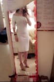 I love the material and it is snug, but I think that is part of the style for this dress. The lining on the inside does shift, so with the white dress, you can see the lining seam when it is not in line with the outer layer. This should be an easy fix though ( I can just add a few stitches on the inside to attach the two layers ensuring they line up).

I'll be wearing this for my convocation, and my boyfriend and family love it. - Jessica S.